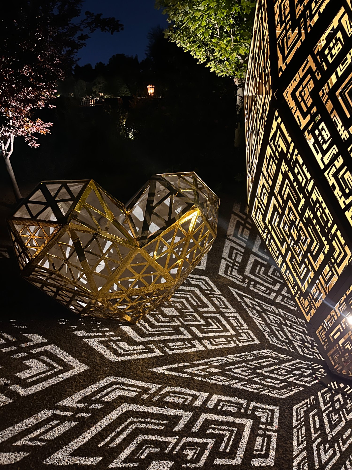 FIOH heart casting geometric light patterns at night